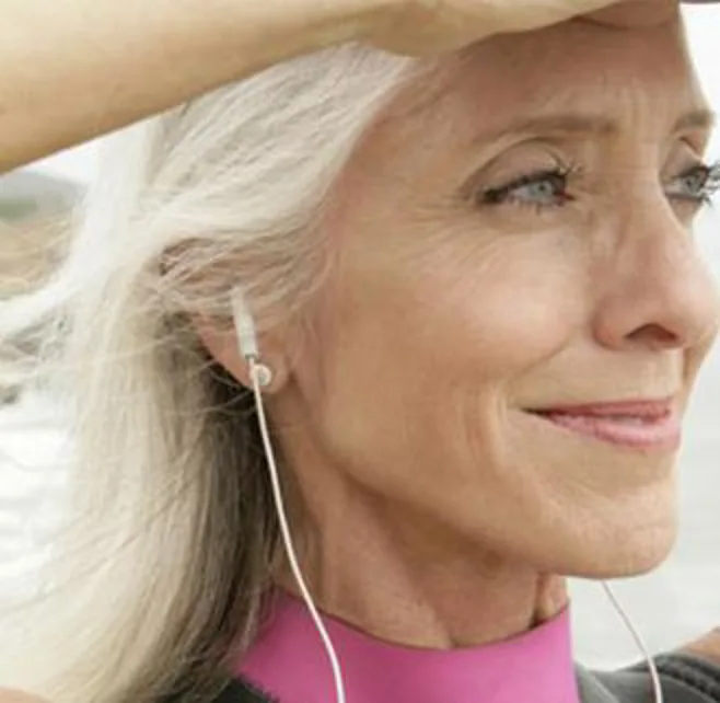 woman wearing earbuds woman wearing earbuds